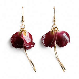 Deep red orchid petal resin earrings with long gold-tone stems