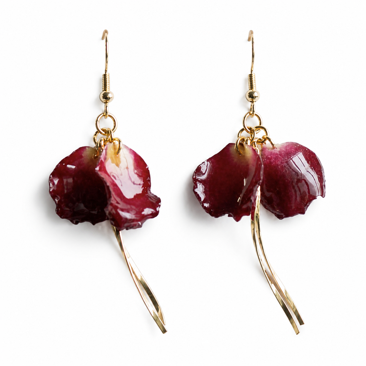 Deep red orchid petal resin earrings with long gold-tone stems