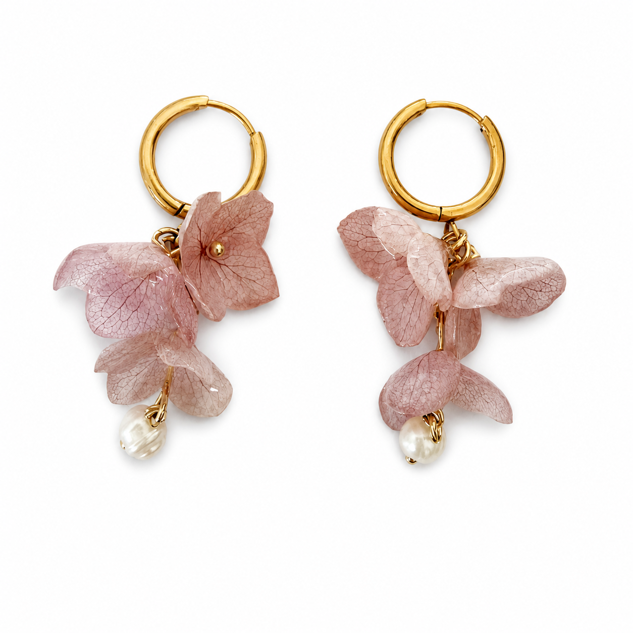 Pink hydrangea resin hoop earrings with freshwater pearls on white background