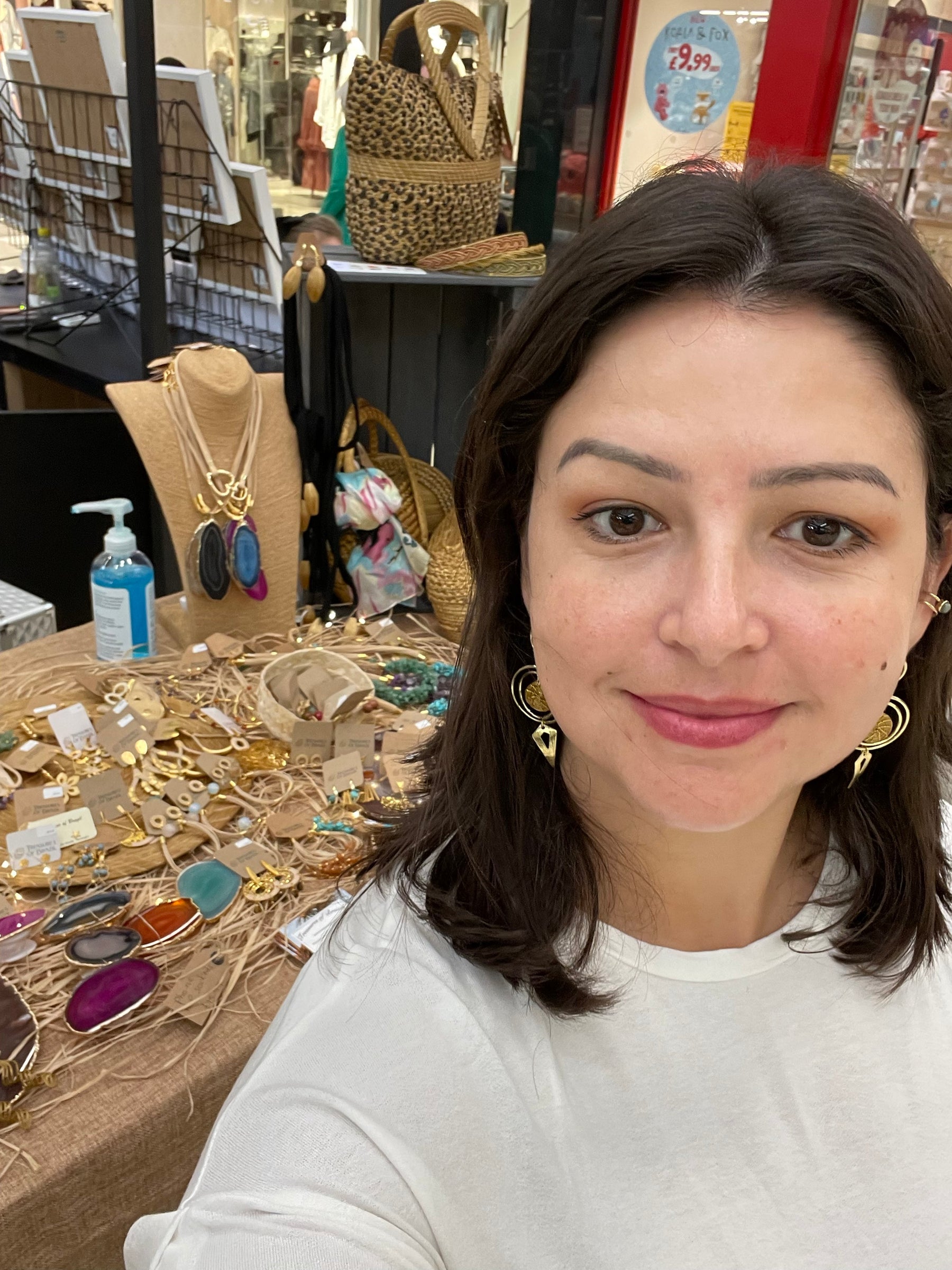 Daiane working beside the original Treasures of Brazil table at the Dolphin Shopping Centre in Poole